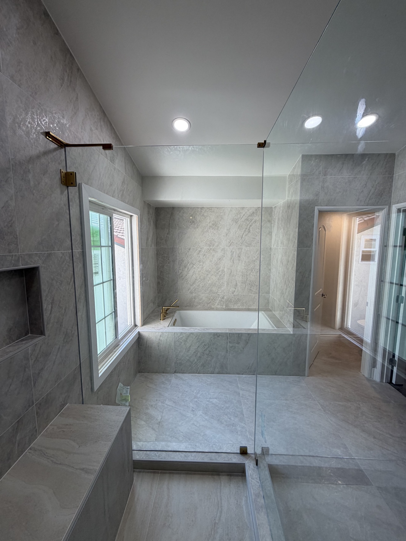 Lake Forest master bathroom remodel by Tiannuo Construction - tub and shower